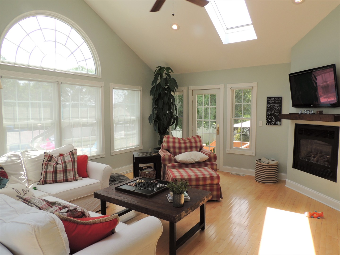 529 West Iowa Street Spring Valley, IL 61362 - Photo 7 of 24 a living room with furniture fireplace and flat screen tv
