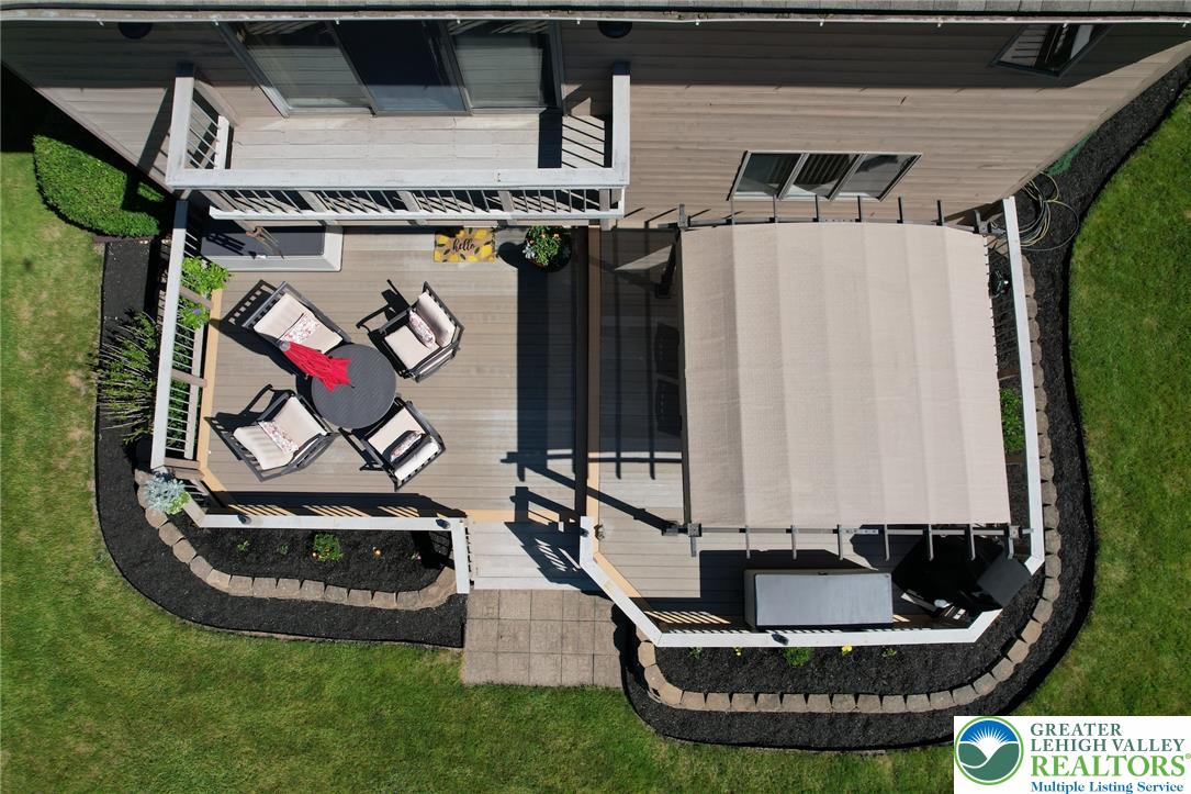 3470 Brodhead Road Bethlehem, PA 18020 - Photo 16 of 84 An aerial perspective reveals a spacious backyard deck, ready for outdoor living and entertaining.