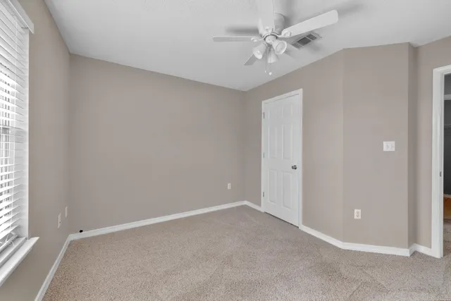 a front view of a house with swimming pool