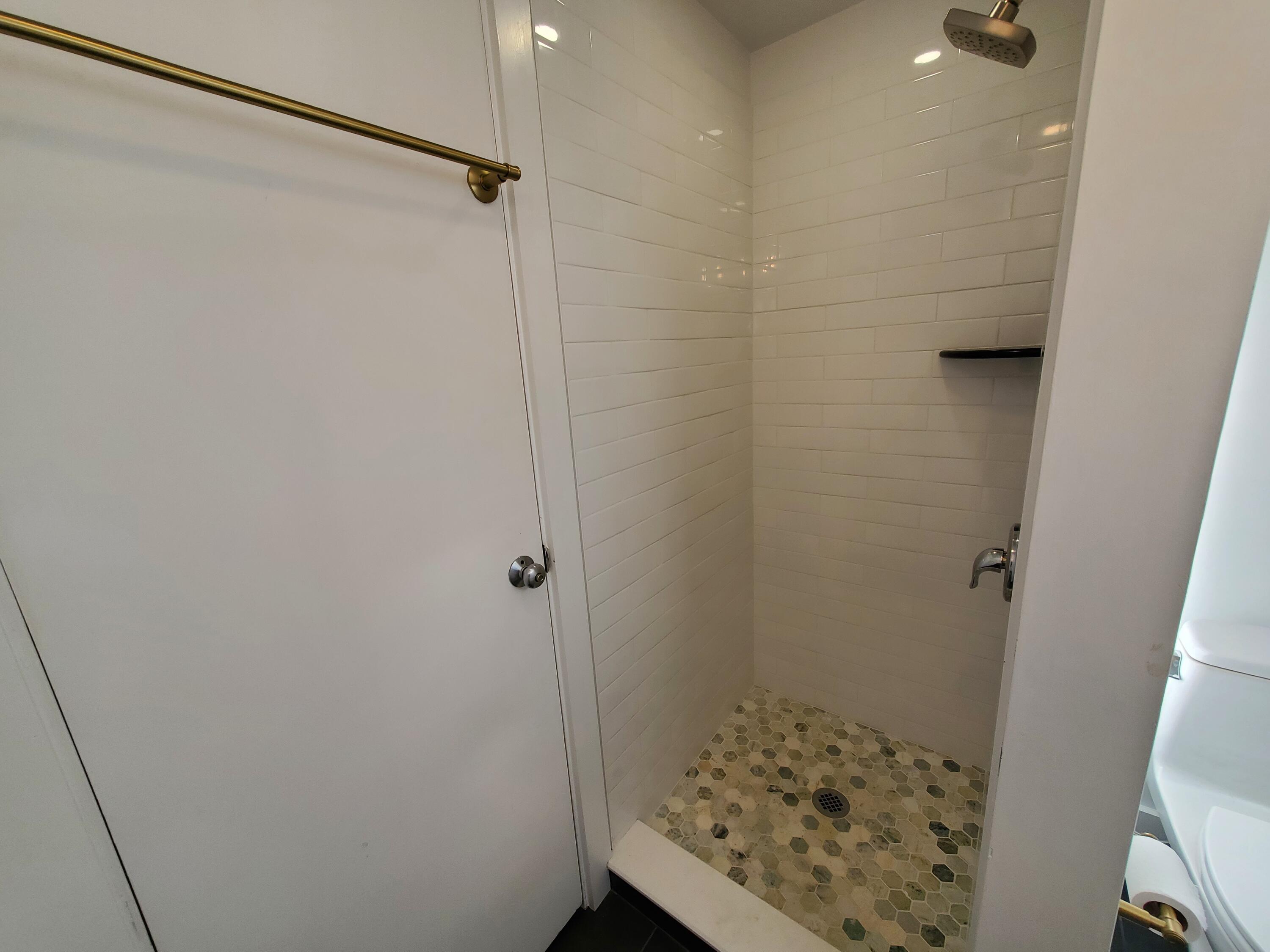 20 Spooner Road Eastham, MA 02642 - Photo 15 of 48 a bathroom with a shower