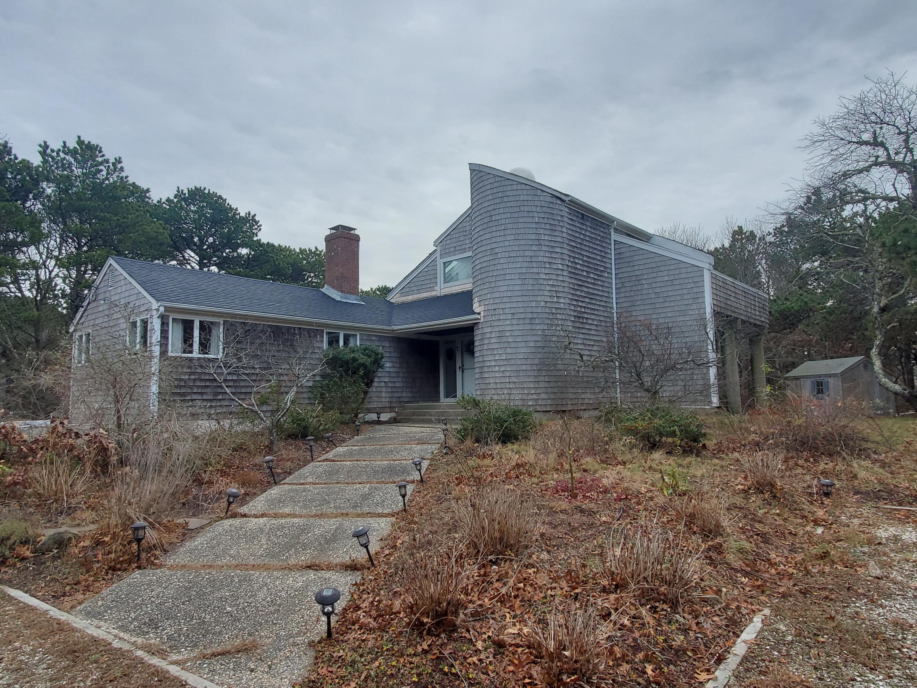 20 Spooner Road Eastham, MA 02642 - Photo 45 of 48 a front view of a house with garden