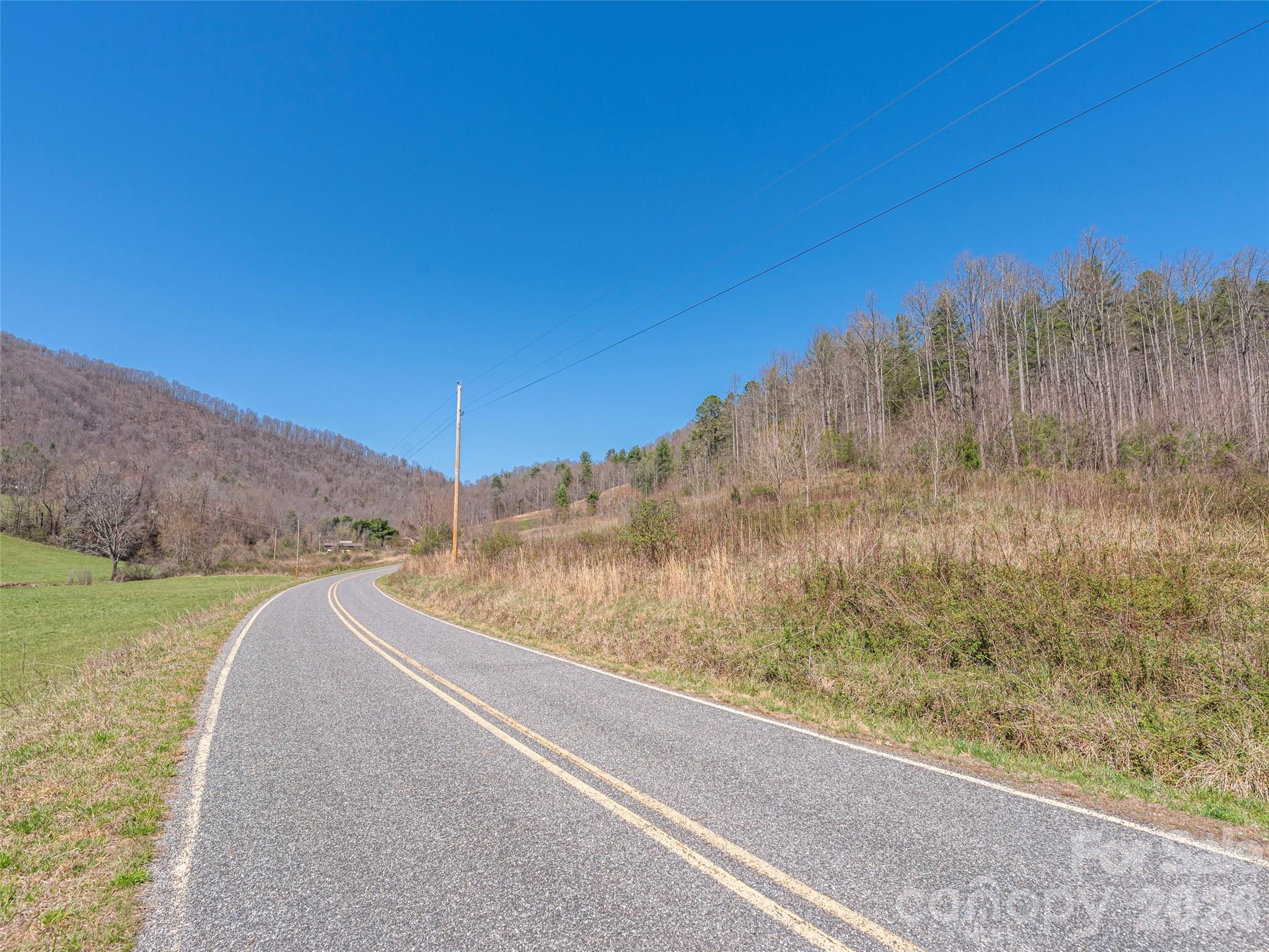 0 Worley Cove Road Marshall, NC 28753 - Photo 18 of 25 a view of a yard with mountain and trees