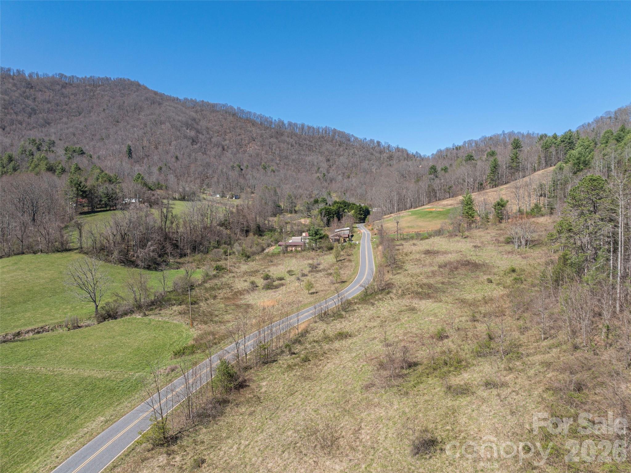 0 Worley Cove Road Marshall, NC 28753 - Photo 21 of 25 a view of a dry yard with mountains in the background