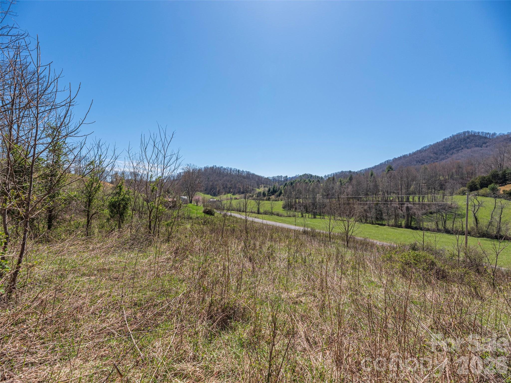 0 Worley Cove Road Marshall, NC 28753 - Photo 5 of 25 a view of a lake with a mountain in the background