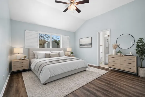 a bedroom with a bed and a dresser