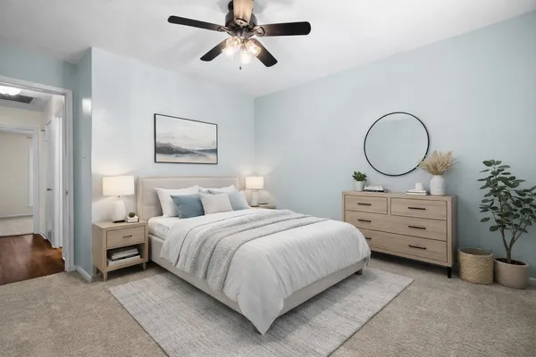 a front view of a house with swimming pool having outdoor seating