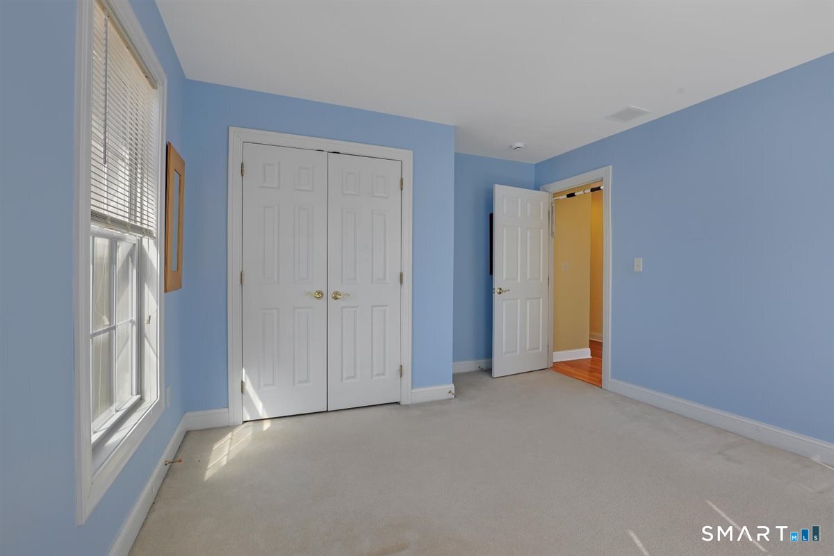 25 Fenwick Drive Avon, CT 06001 - Photo 30 of 40 a view of an empty room with a window