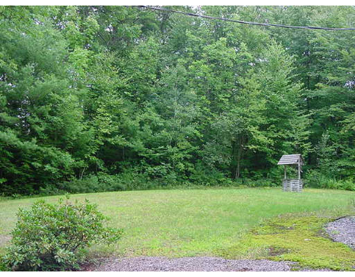 118 Wheeler Road Princeton, MA 01541 - Photo 2 of 6 a view of a backyard with a garden