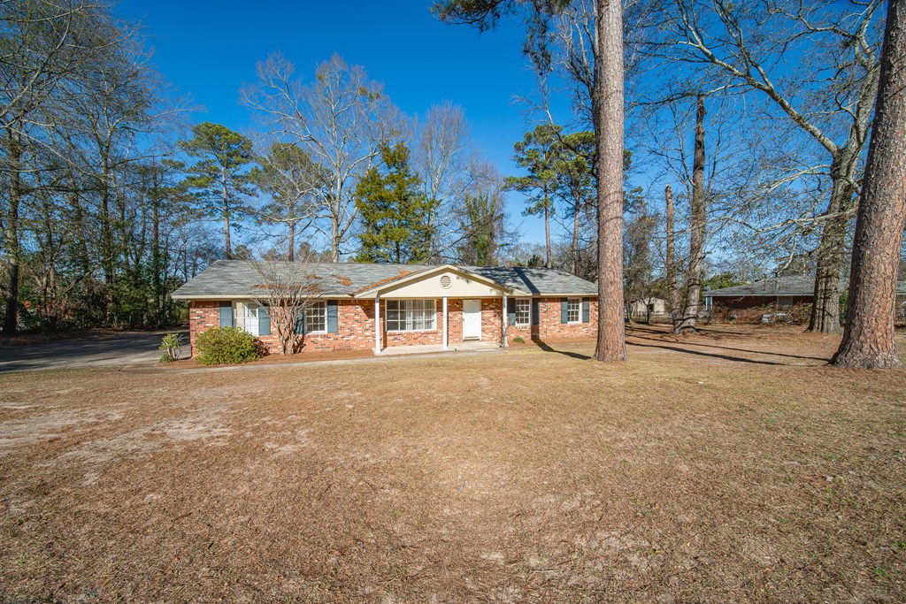 1829 Celeste Drive Columbus, GA 31907 - Photo 2 of 33 a view of a house with a yard and sitting area