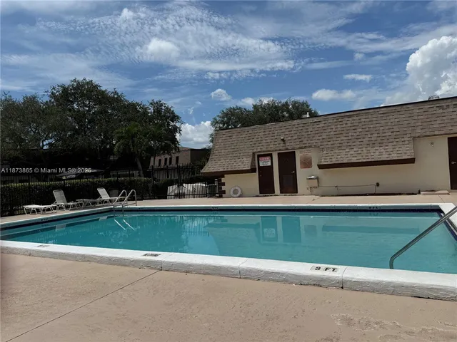 a view of a back yard of the house