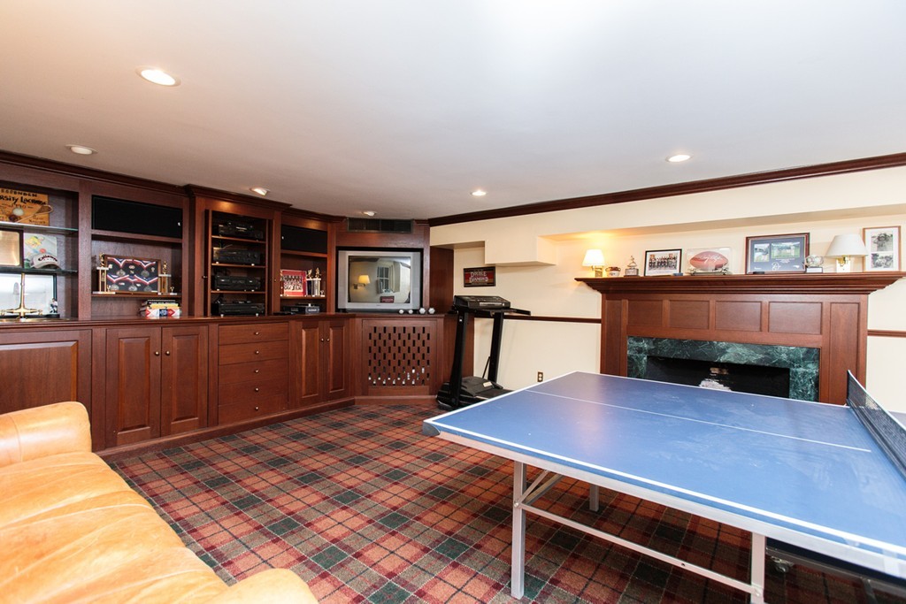 30 Old Farm Road Wellesley, MA 02481 - Photo 11 of 15 a view of a livingroom with furniture and staircase