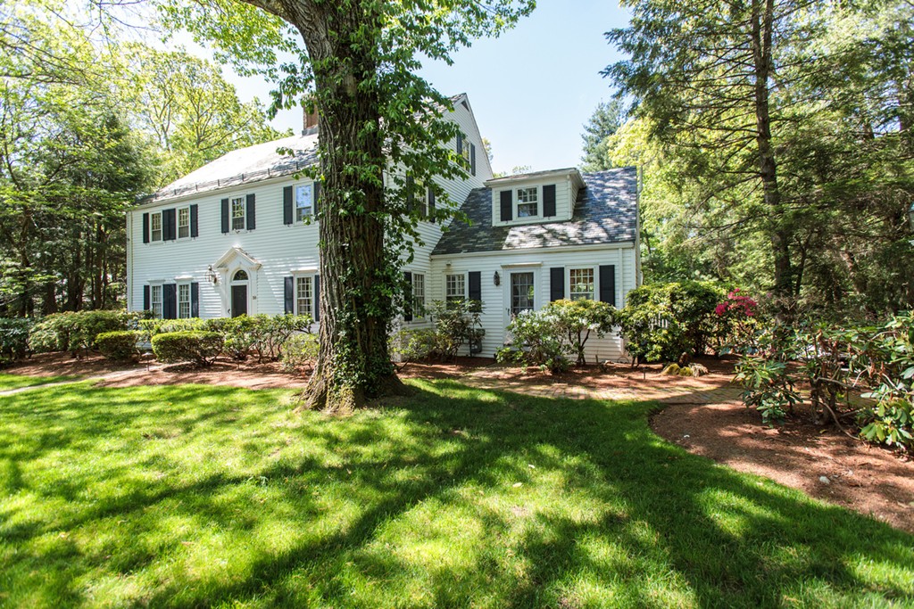 30 Old Farm Road Wellesley, MA 02481 - Photo 2 of 15 a front view of a house with a yard