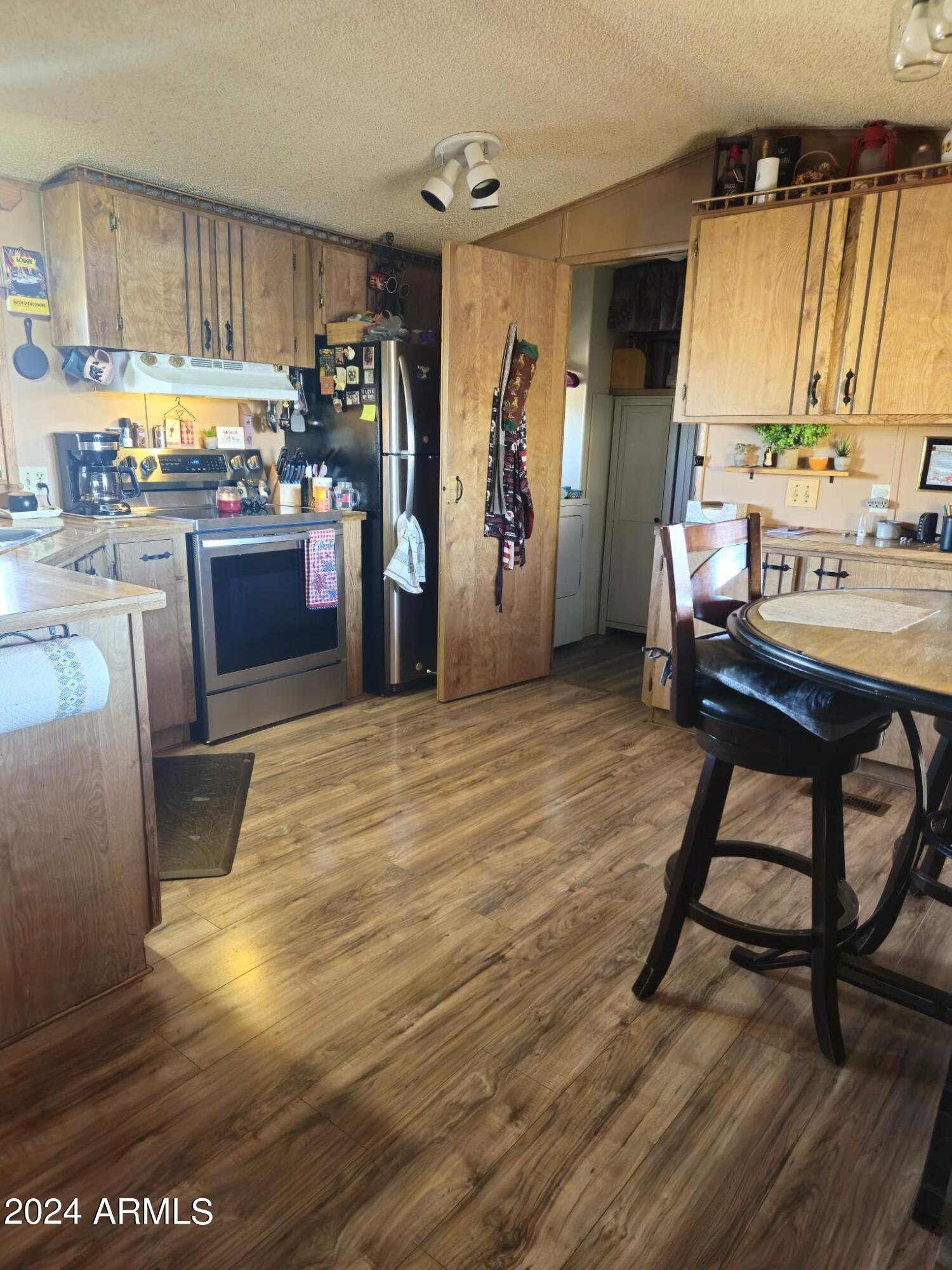 3250 South Geronimo Road Apache Junction, AZ 85119 - Photo 8 of 23 View from Living to Kitchen