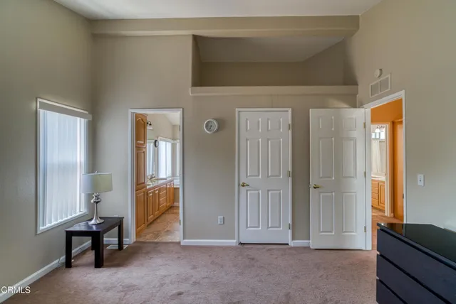 a view of livingroom with furniture and windows