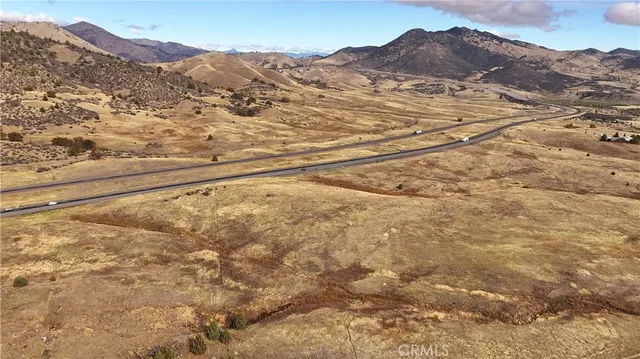 a view of mountain view with mountains in the background