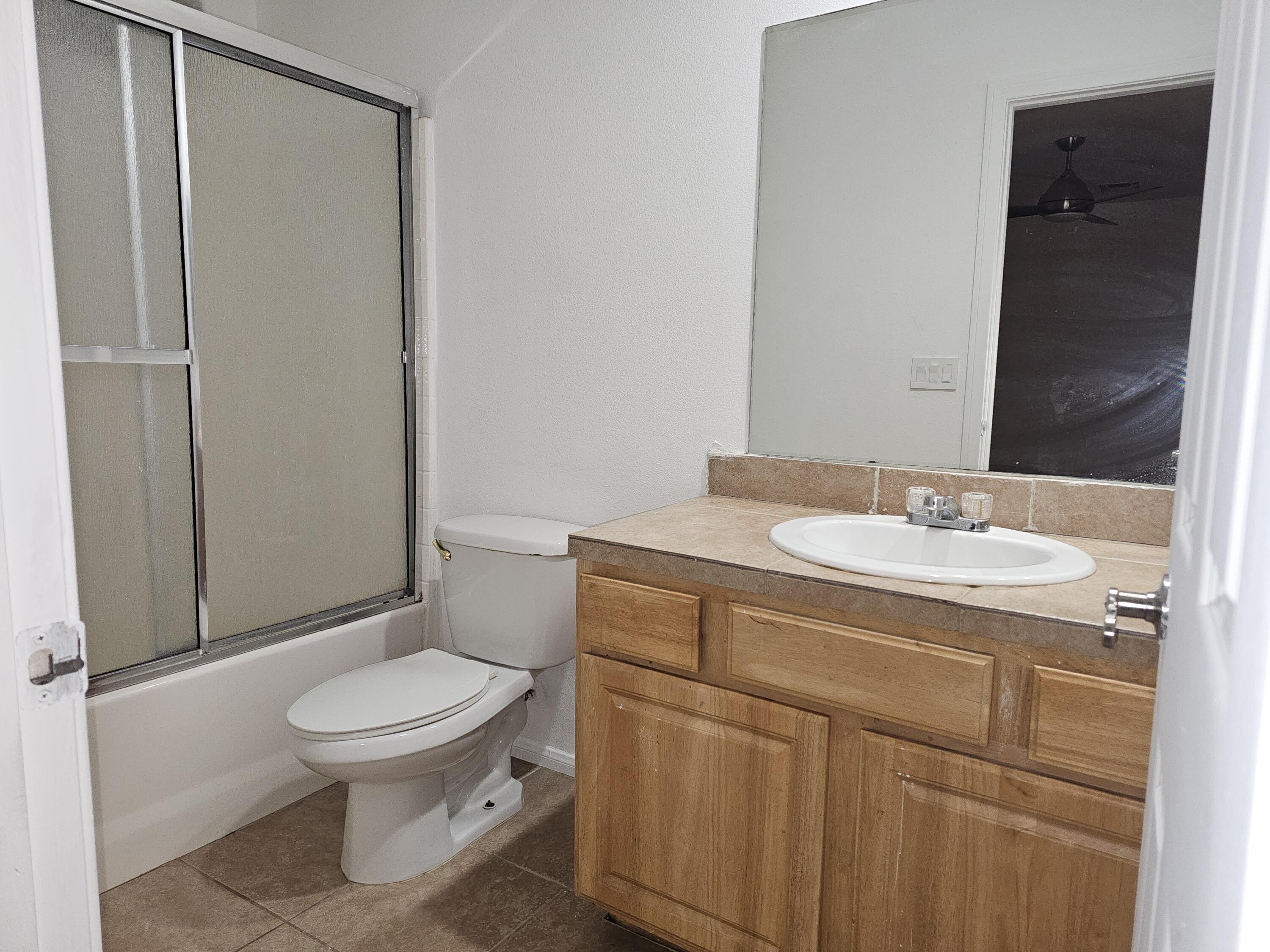 2799 Jester Avenue Thermal, CA 92274 - Photo 16 of 16 a bathroom with a sink toilet and shower