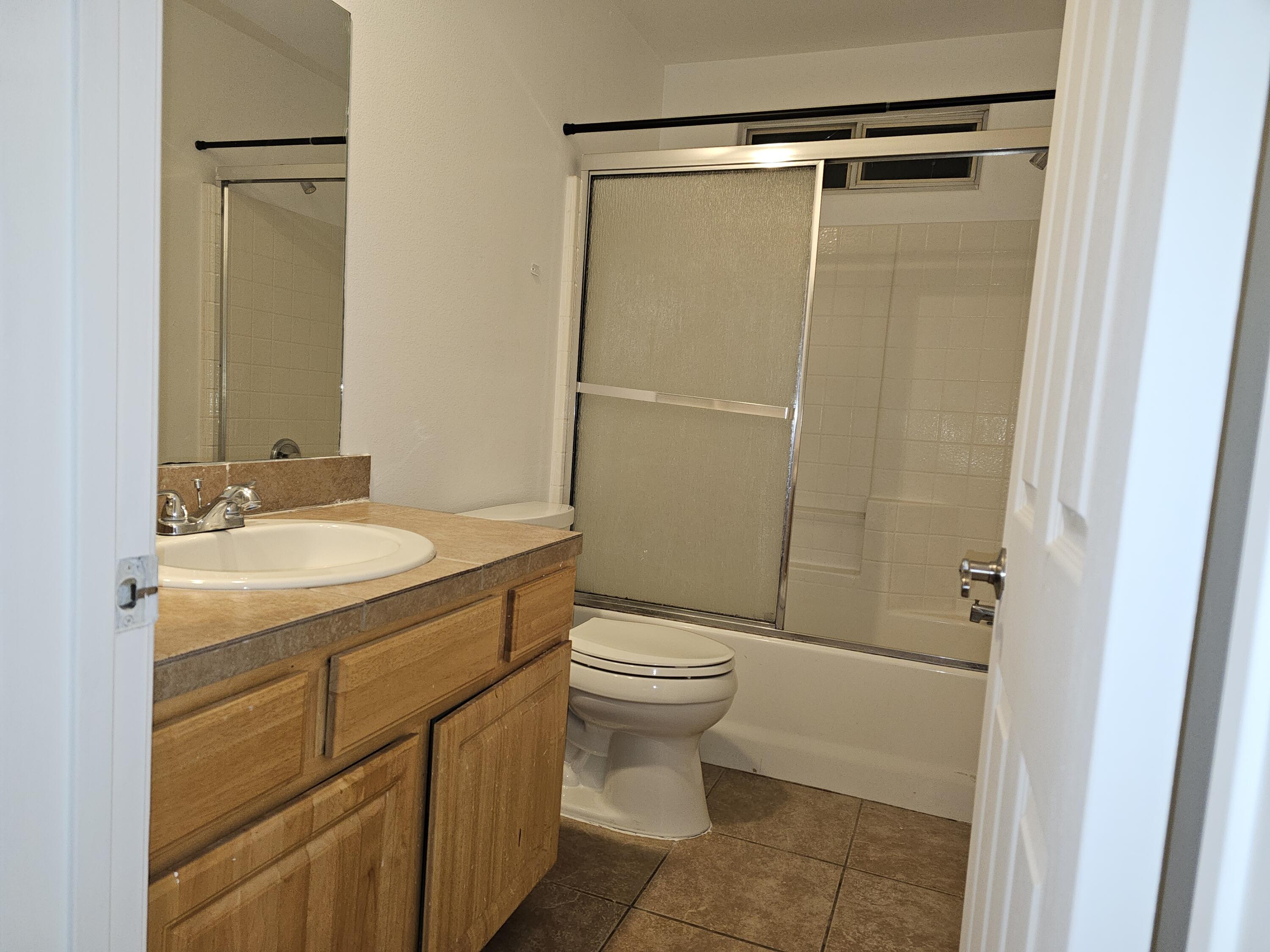 2799 Jester Avenue Thermal, CA 92274 - Photo 8 of 16 a bathroom with a sink toilet and shower