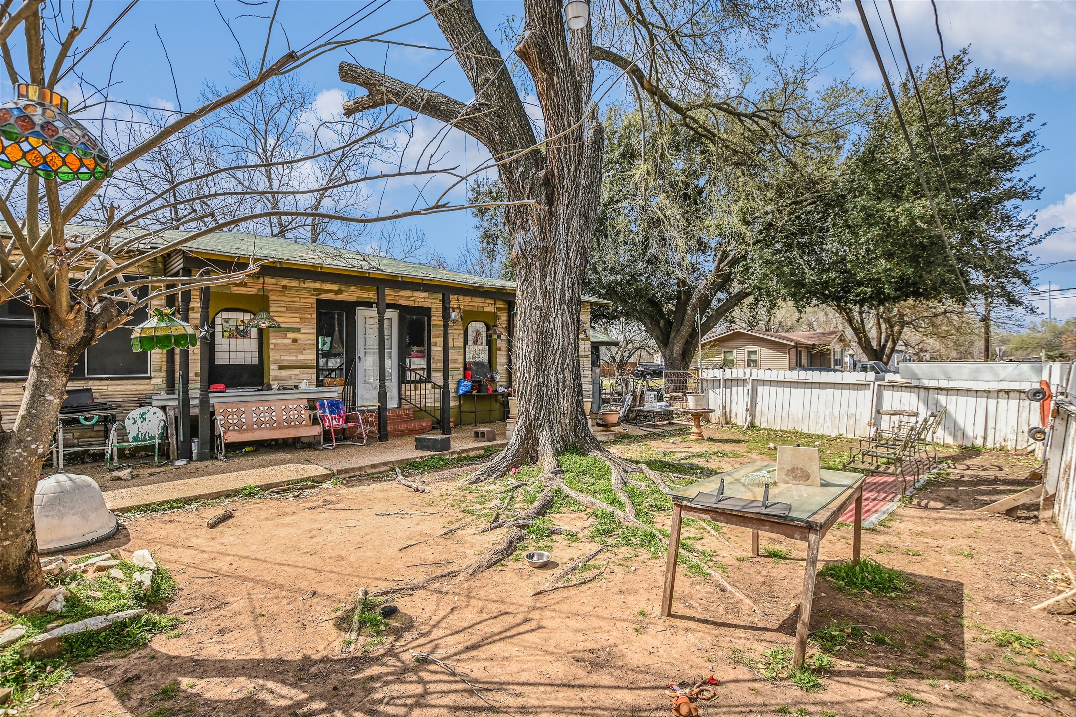 5405 Prock Lane Austin, TX 78721 - Photo 8 of 13 a view of a house with backyard porch and sitting area