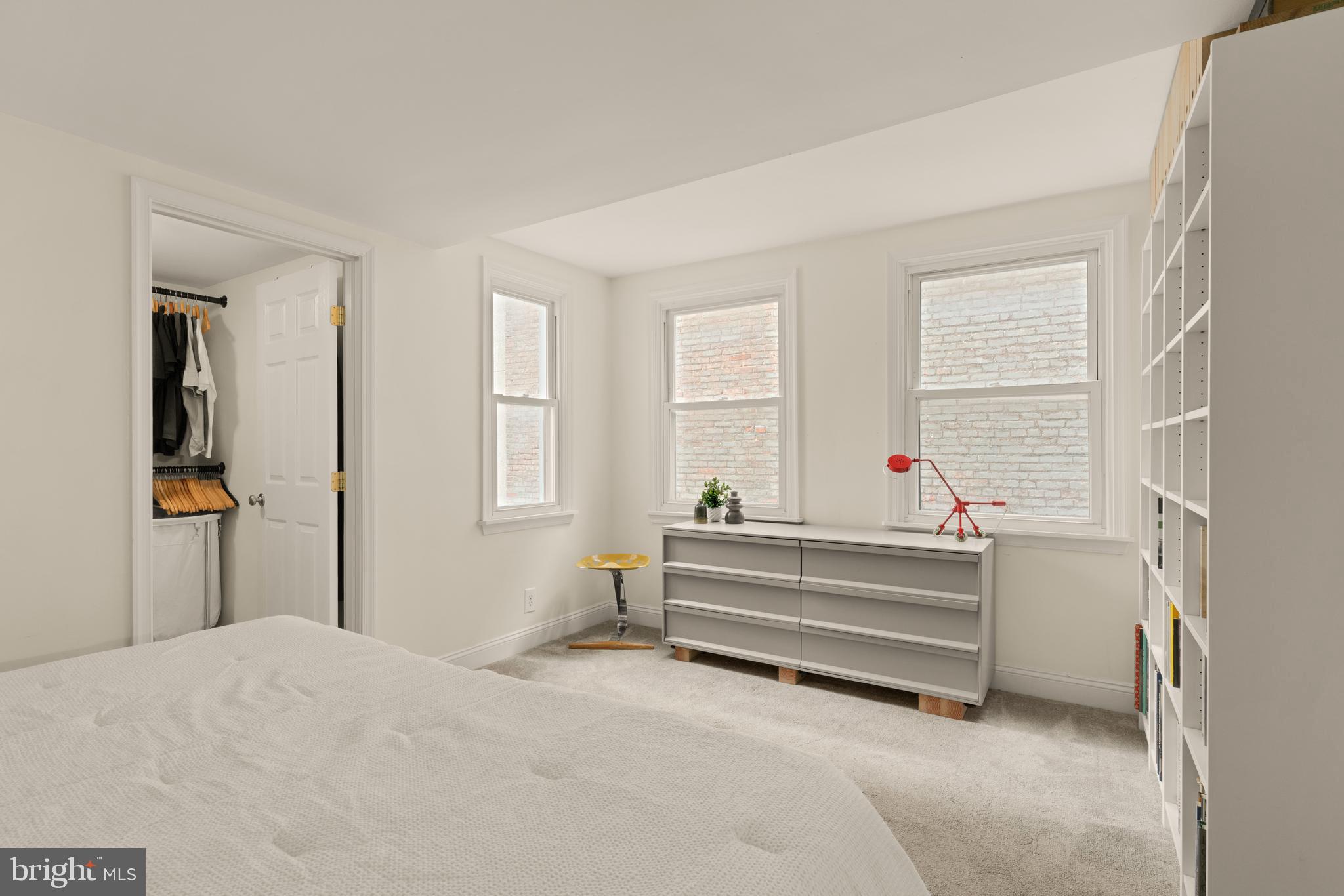 512 Cathedral Street, Unit 3 Baltimore, MD 21201 - Photo 20 of 38 a view of bedroom with wooden floor and windows