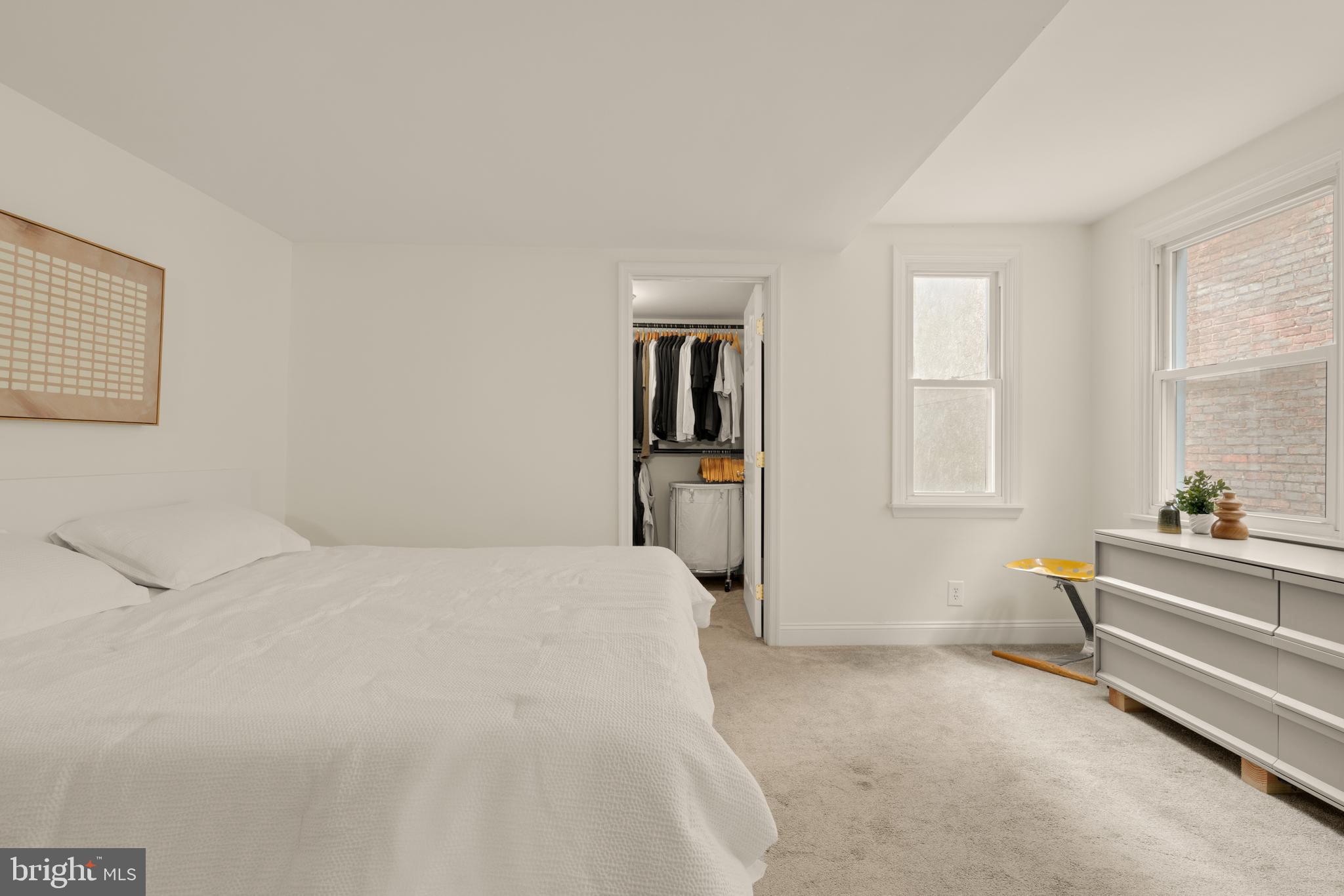 512 Cathedral Street, Unit 3 Baltimore, MD 21201 - Photo 23 of 38 a bedroom with a bed and a window