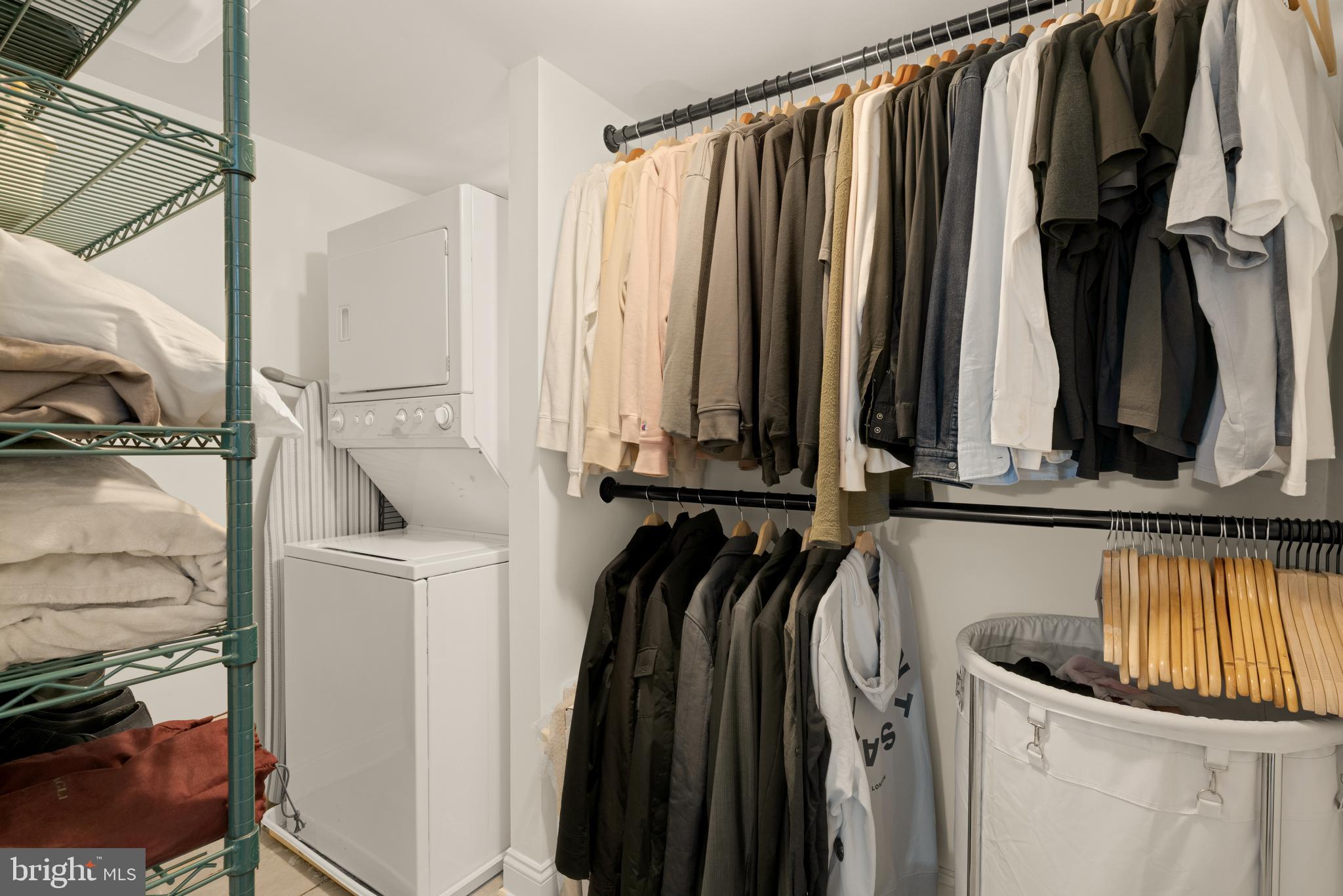 512 Cathedral Street, Unit 3 Baltimore, MD 21201 - Photo 24 of 38 a view of walk in closet with clothes and shoes