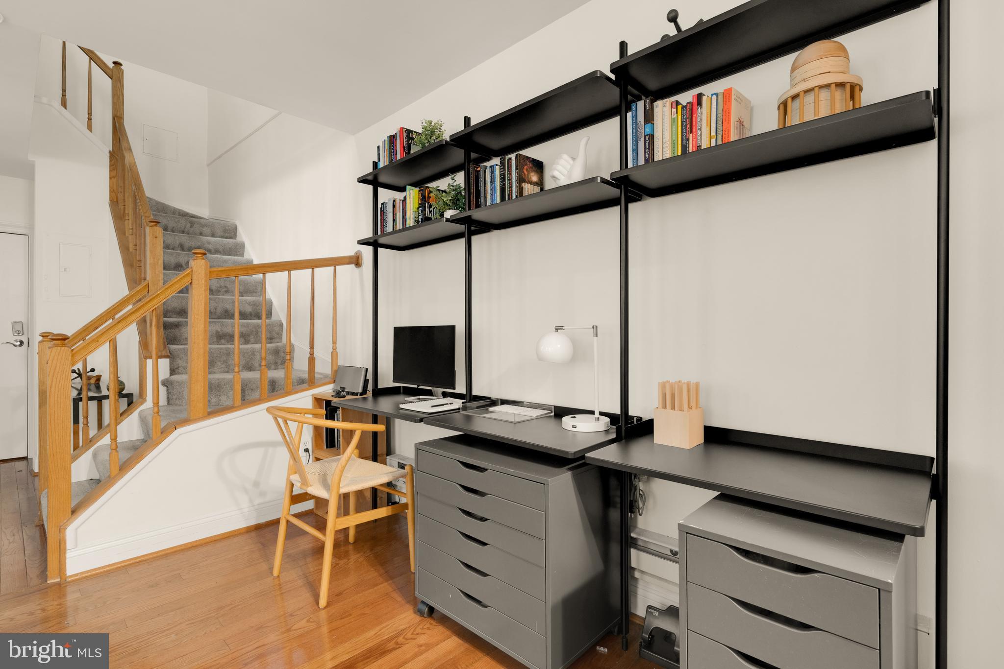 512 Cathedral Street, Unit 3 Baltimore, MD 21201 - Photo 6 of 38 a view of workspace with wooden floor windows