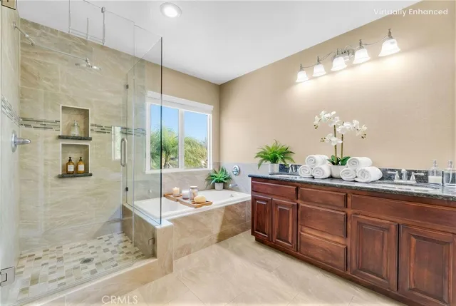 a view of a house with pool and sitting area