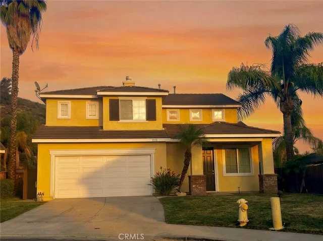 a kitchen with stainless steel appliances granite countertop a refrigerator stove microwave and sink