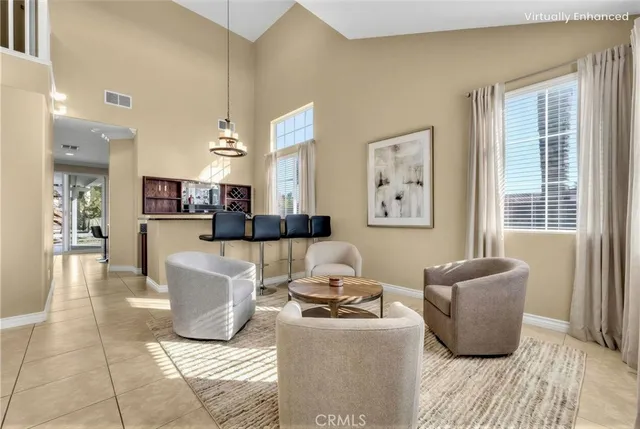 a kitchen with stainless steel appliances granite countertop a stove top oven a sink dishwasher and a refrigerator