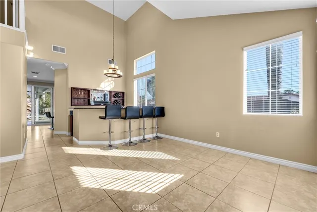 a kitchen with a stove sink and cabinets