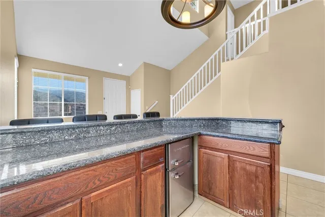 a view of a storage & utility room with dryer and washer