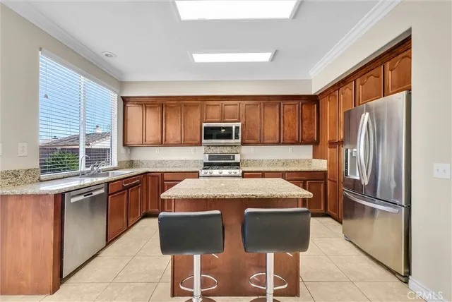 a bathroom with a toilet a sink and a mirror