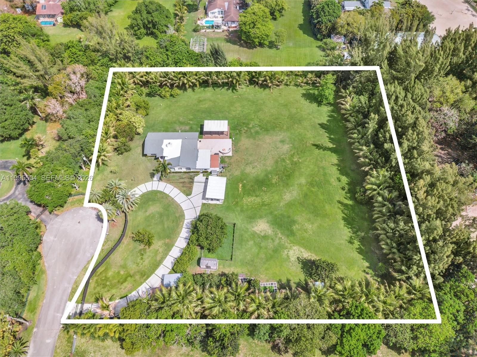6920 Southwest 182nd Way Southwest Ranches, FL 33331 - Photo 54 of 61 an aerial view of a house
