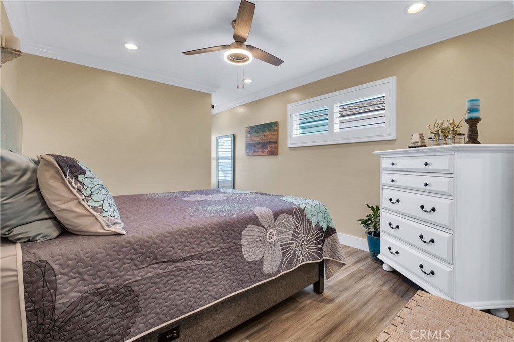 3638 North Studebaker Road Long Beach, CA 90808 - Photo 30 of 55 a bedroom with a bed and a dresser