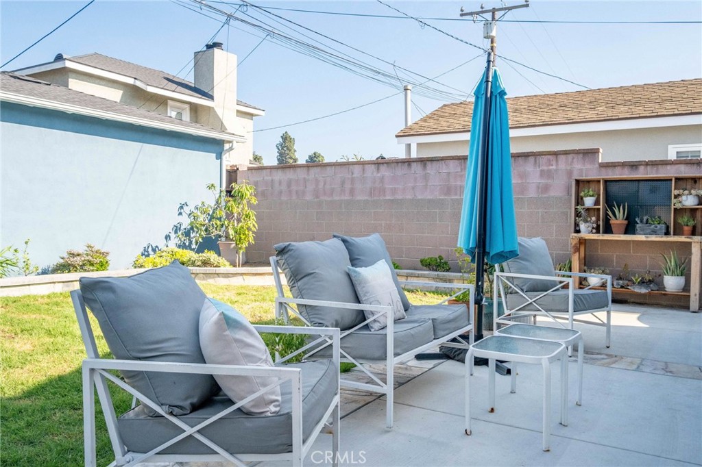 3638 North Studebaker Road Long Beach, CA 90808 - Photo 40 of 55 a view of an chairs and tables in the patio