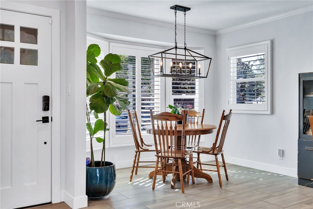 3638 North Studebaker Road Long Beach, CA 90808 - Photo 4 of 55 a view of a dining room with furniture window and flowerpot