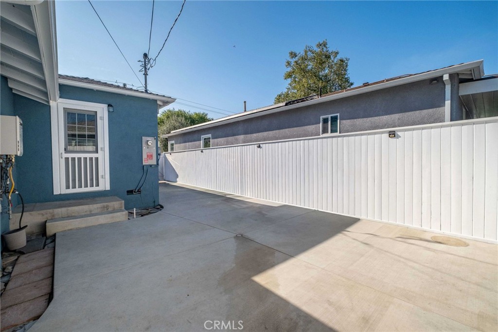 3638 North Studebaker Road Long Beach, CA 90808 - Photo 45 of 55 a view of a house with a garage