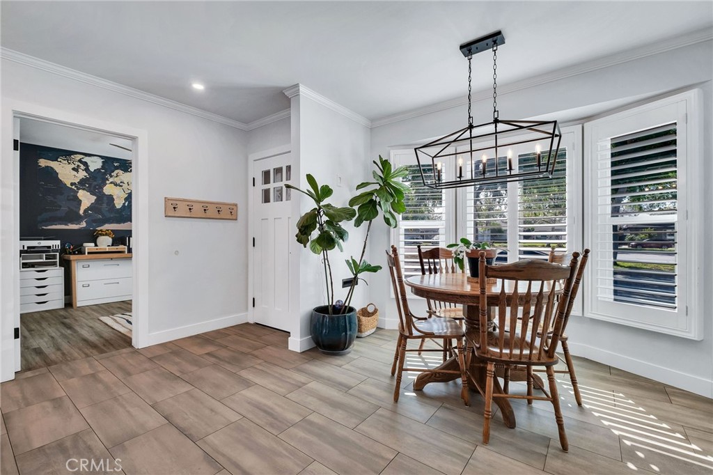 3638 North Studebaker Road Long Beach, CA 90808 - Photo 5 of 55 a view of a dining room with furniture window and wooden floor