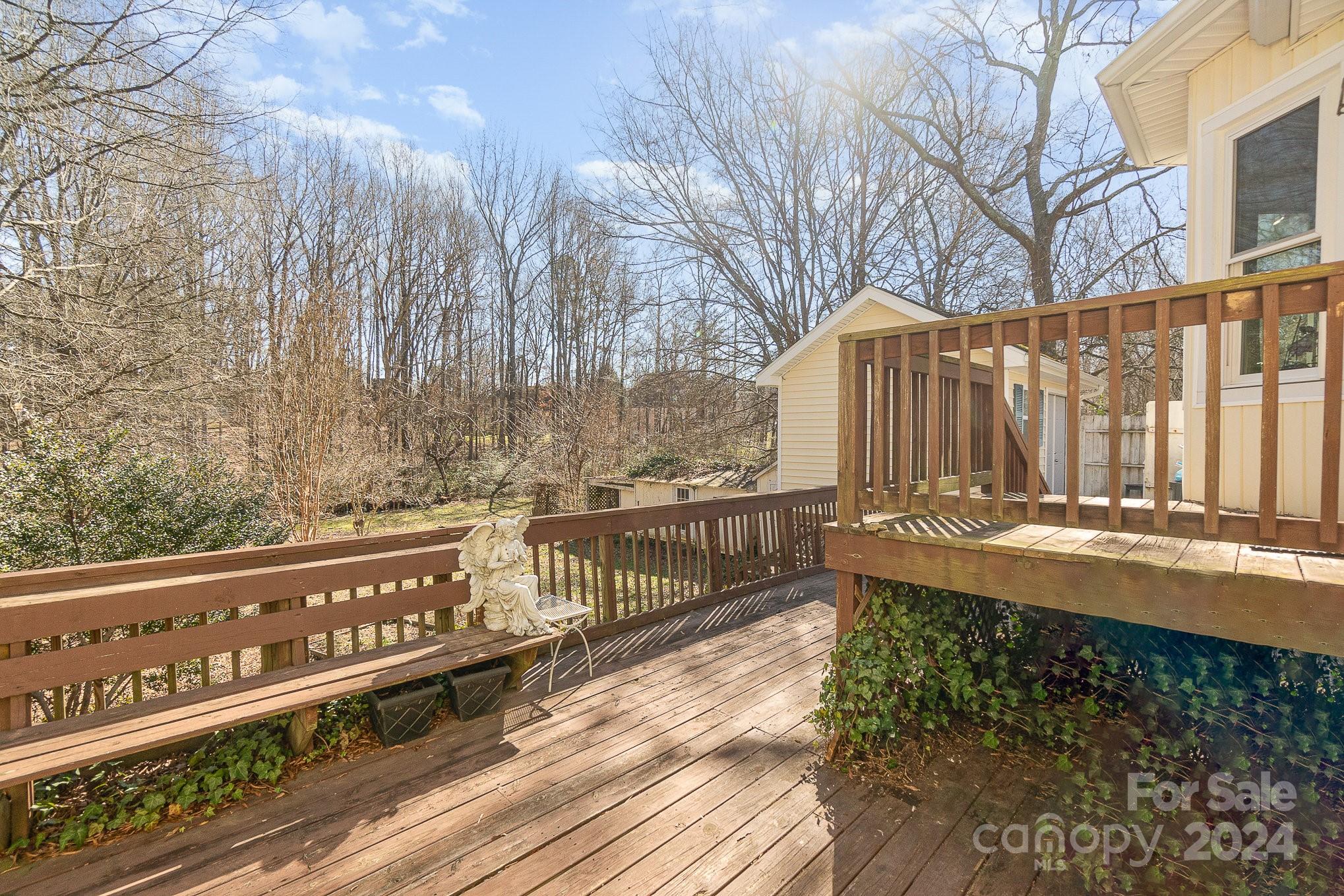 21014 Pine Ridge Drive Cornelius, NC 28031 - Photo 23 of 33 a view of a street with wooden fence