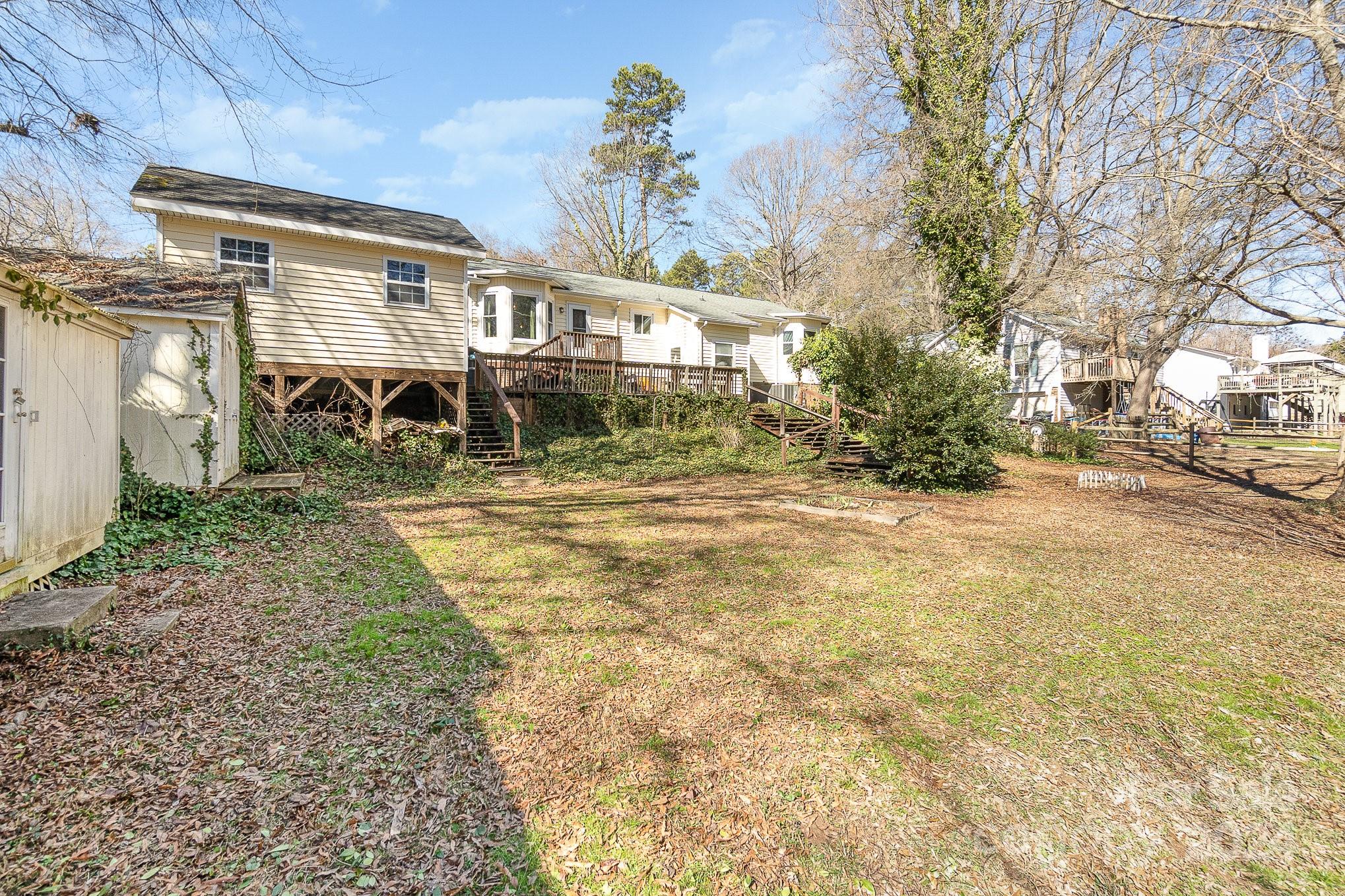 21014 Pine Ridge Drive Cornelius, NC 28031 - Photo 27 of 33 a view of a yard with a house