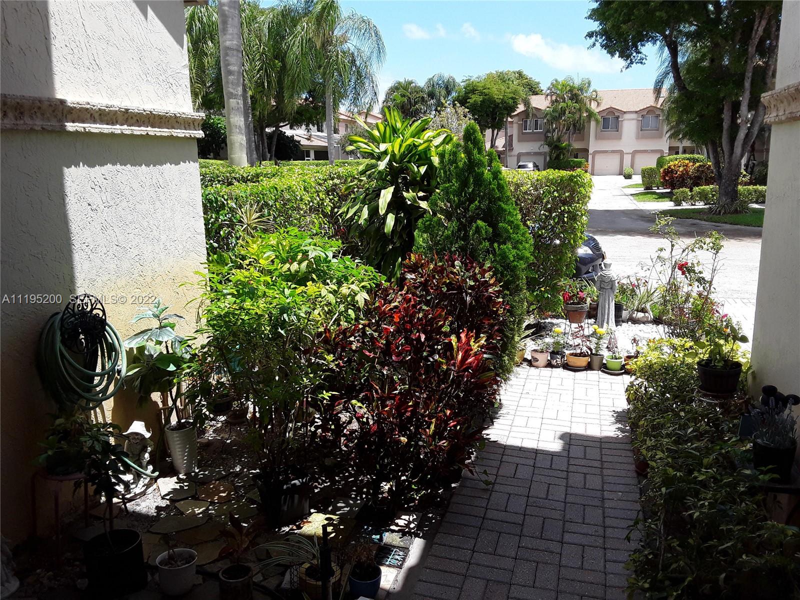 6810 Via Regina, Unit 40 Boca Raton, FL 33433 - Photo 12 of 45 Photo taken from Front Door Looking Out