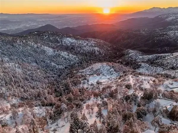 a view of a large mountains in the background