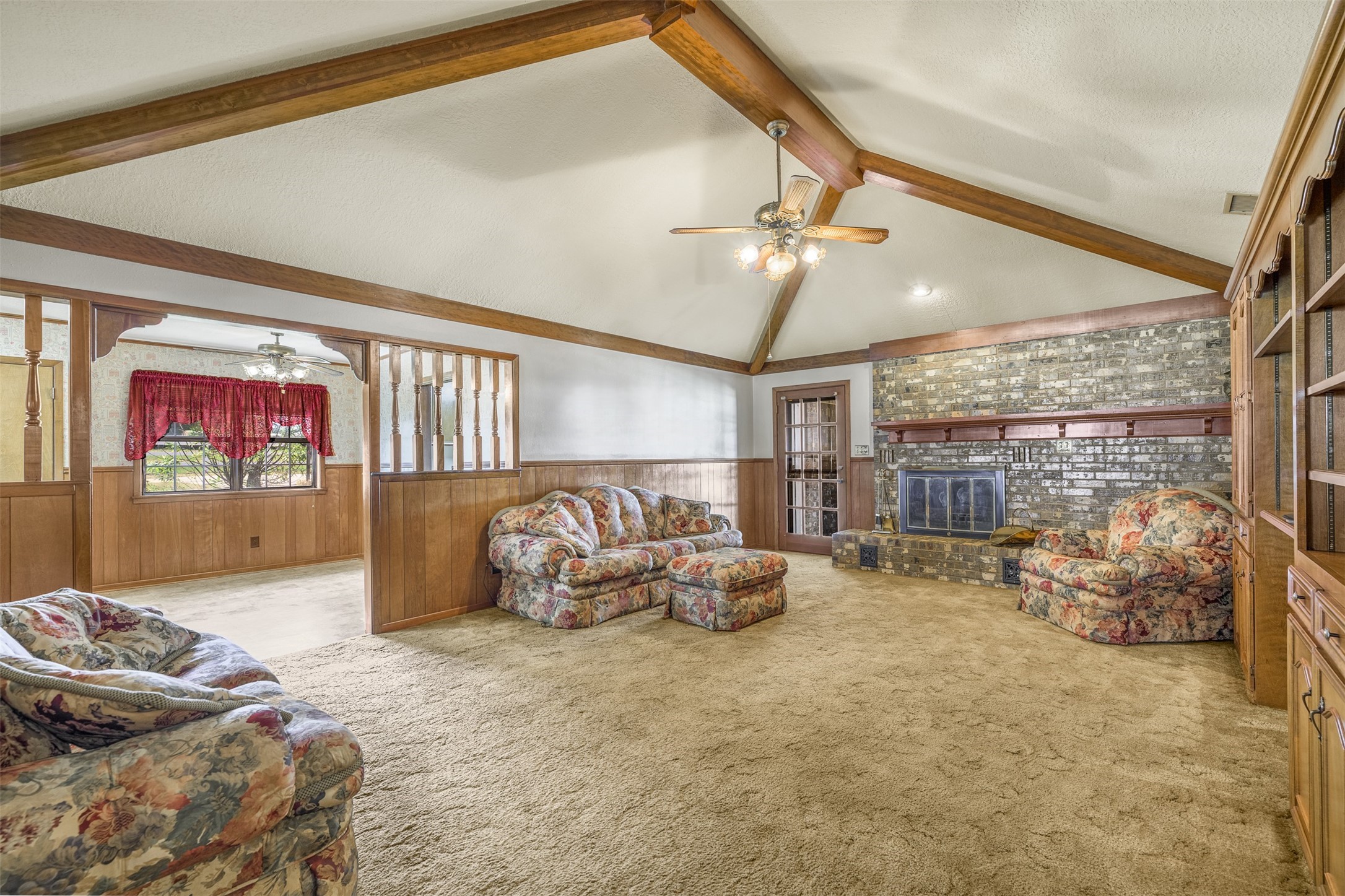 6700 FM 332 Road Brenham, TX 77833 - Photo 14 of 36 a bedroom with furniture and a ceiling fan