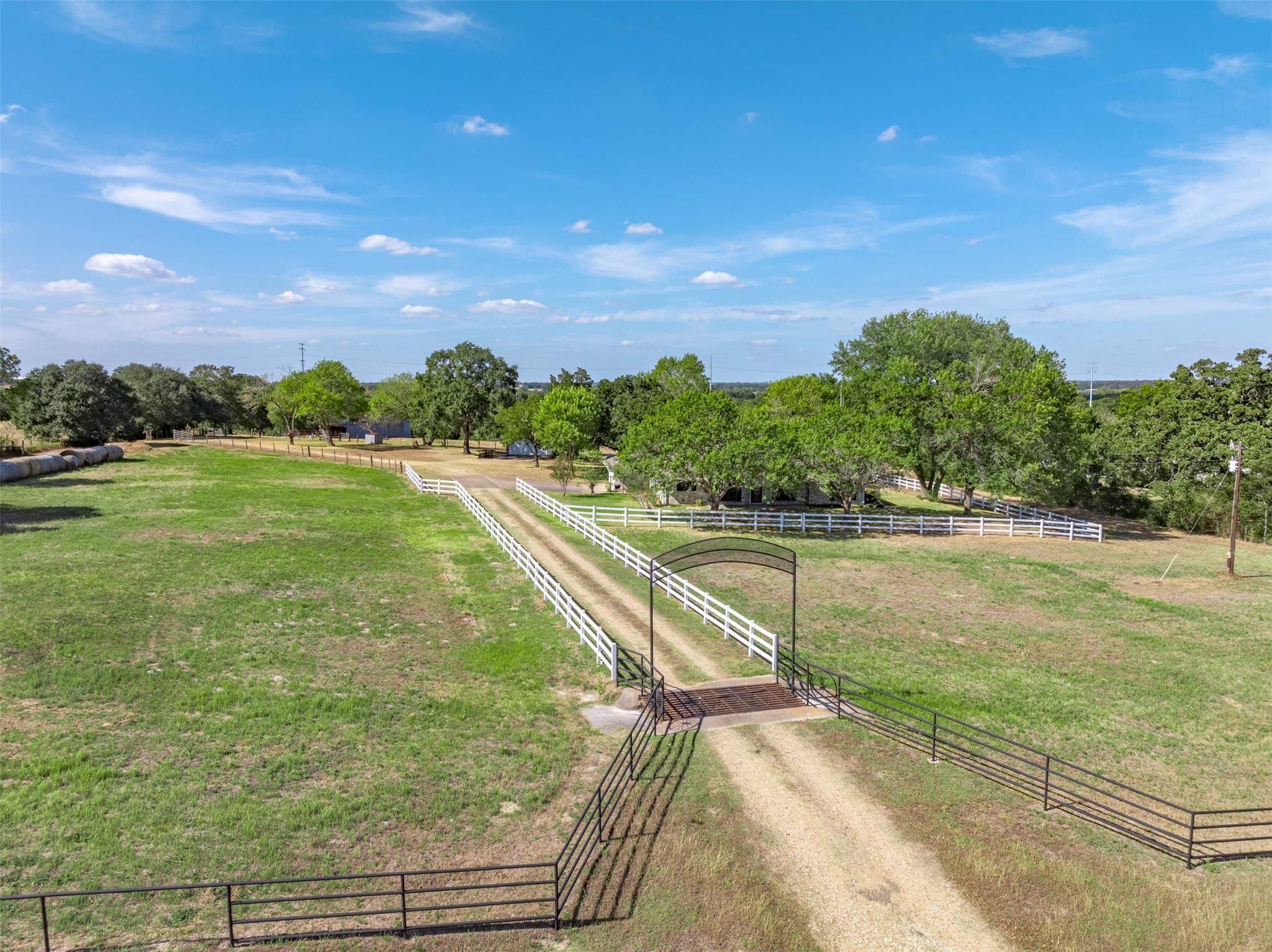 6700 FM 332 Road Brenham, TX 77833 - Photo 2 of 36 a view of a lake with a yard