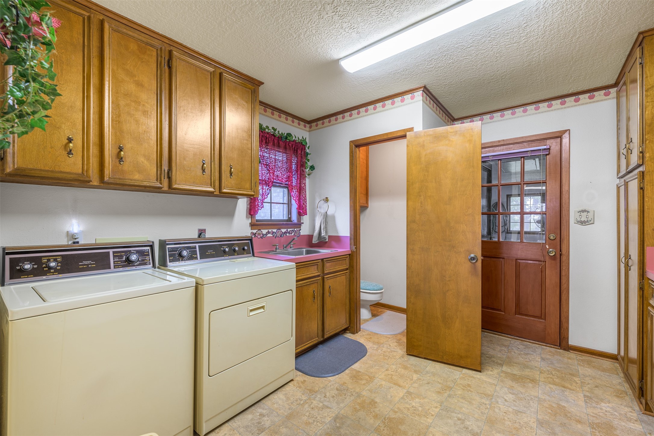 6700 FM 332 Road Brenham, TX 77833 - Photo 24 of 36 a utility room with dryer and washer