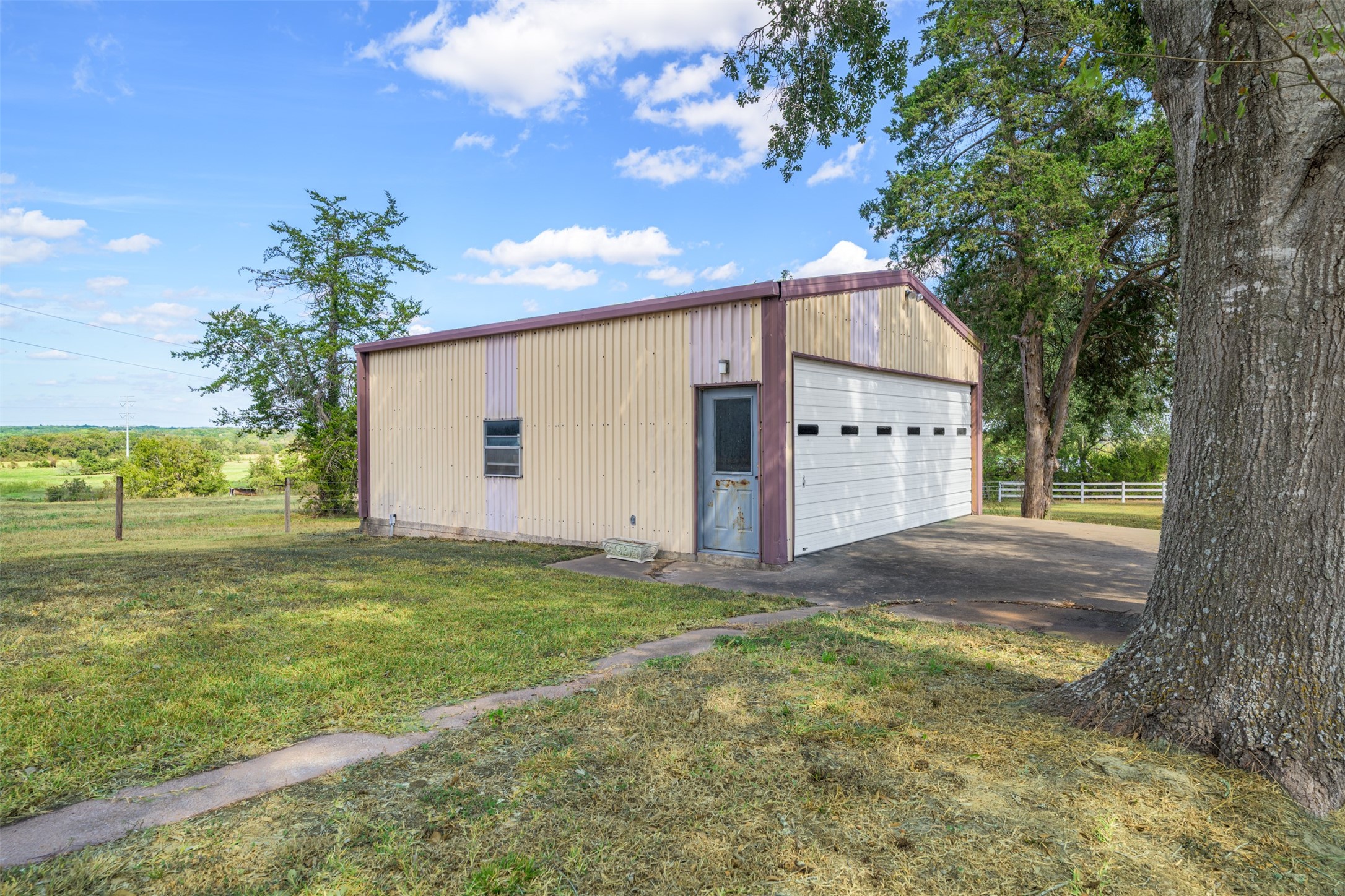6700 FM 332 Road Brenham, TX 77833 - Photo 29 of 36 a view of a backyard of the house