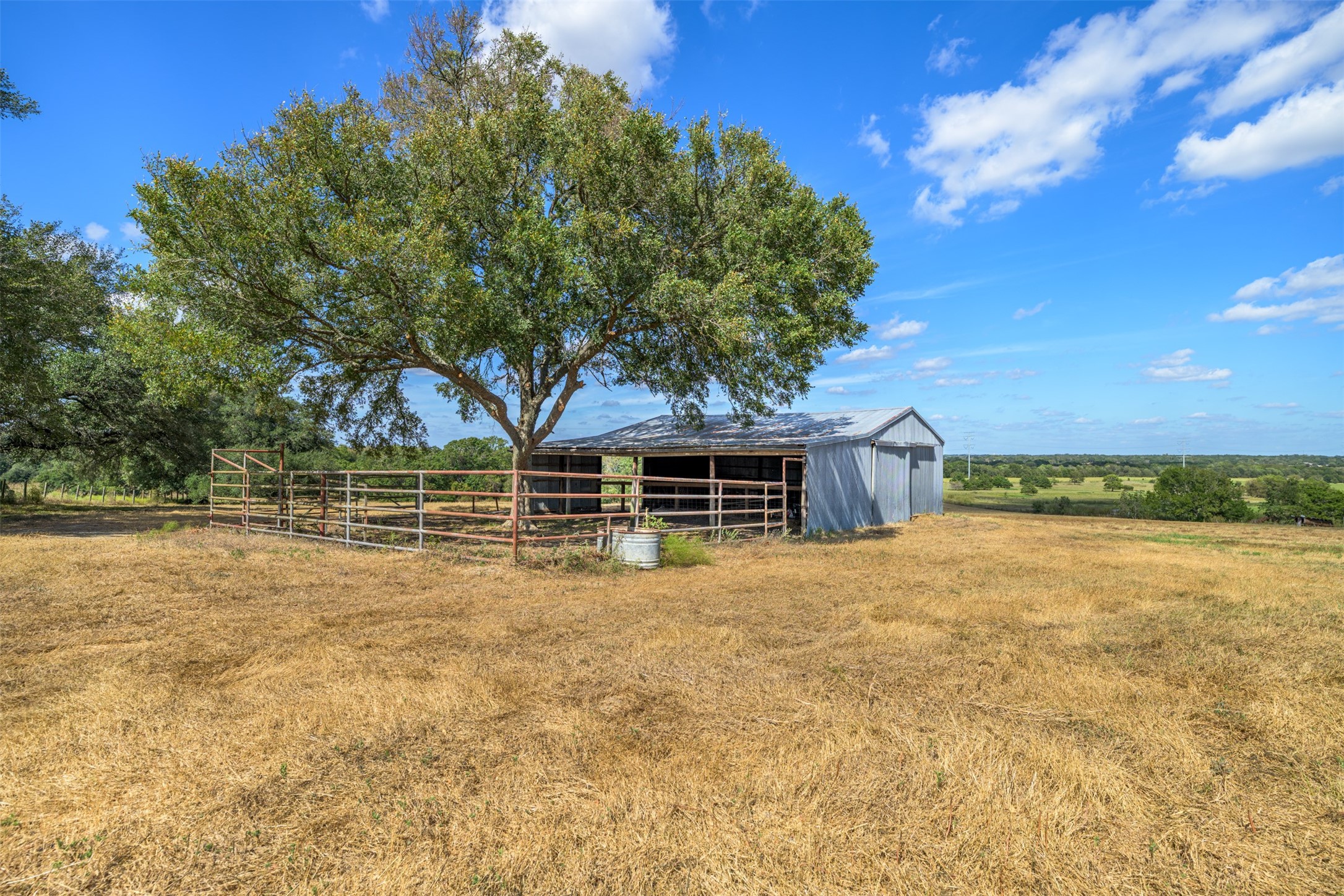 6700 FM 332 Road Brenham, TX 77833 - Photo 30 of 36 a house with trees in front of it