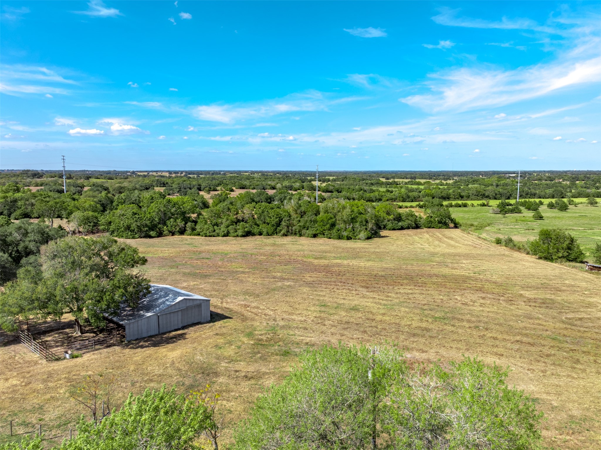 6700 FM 332 Road Brenham, TX 77833 - Photo 4 of 36 a view of an outdoor space and a yard