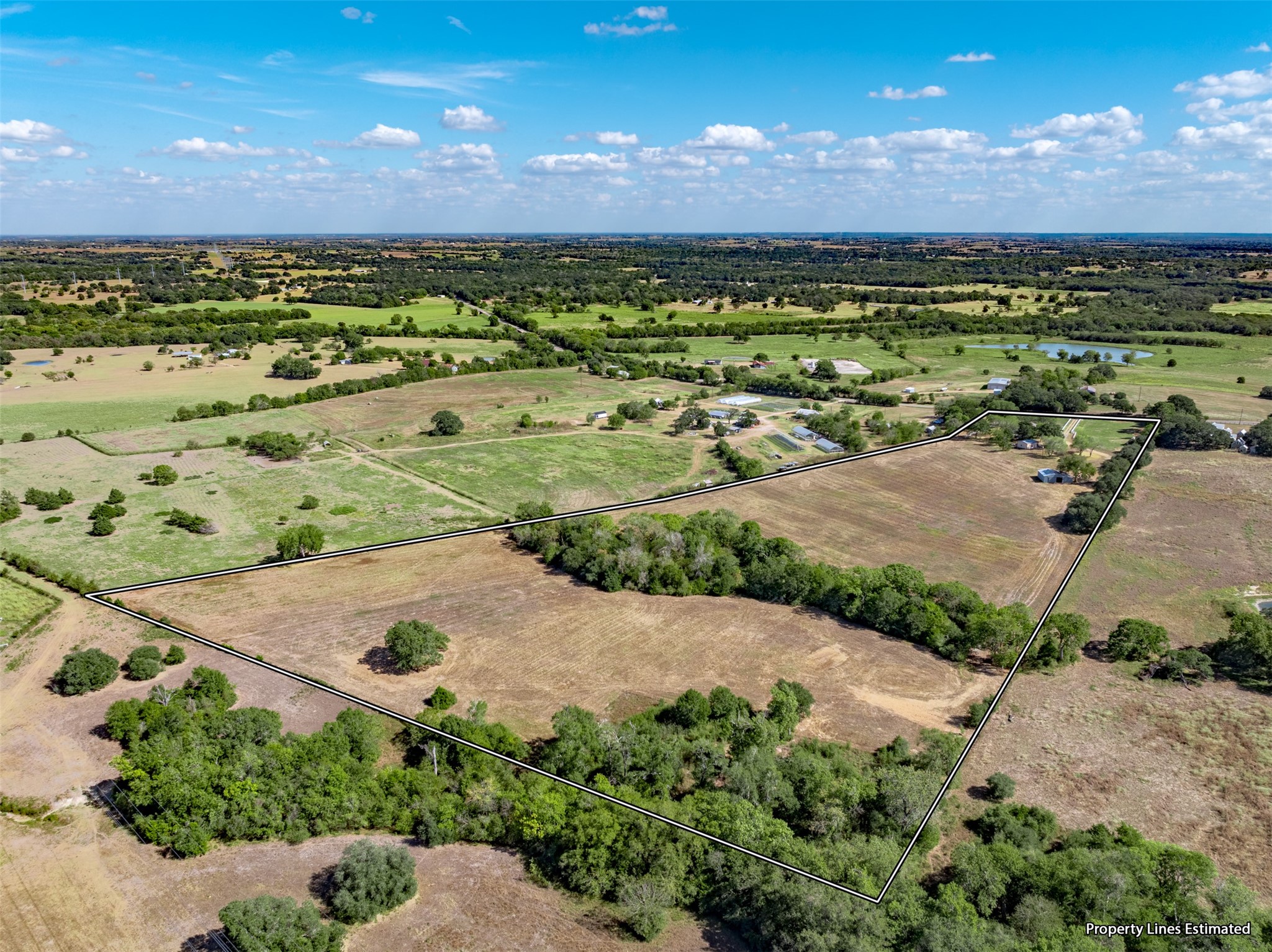 6700 FM 332 Road Brenham, TX 77833 - Photo 5 of 36 an aerial view of a yard