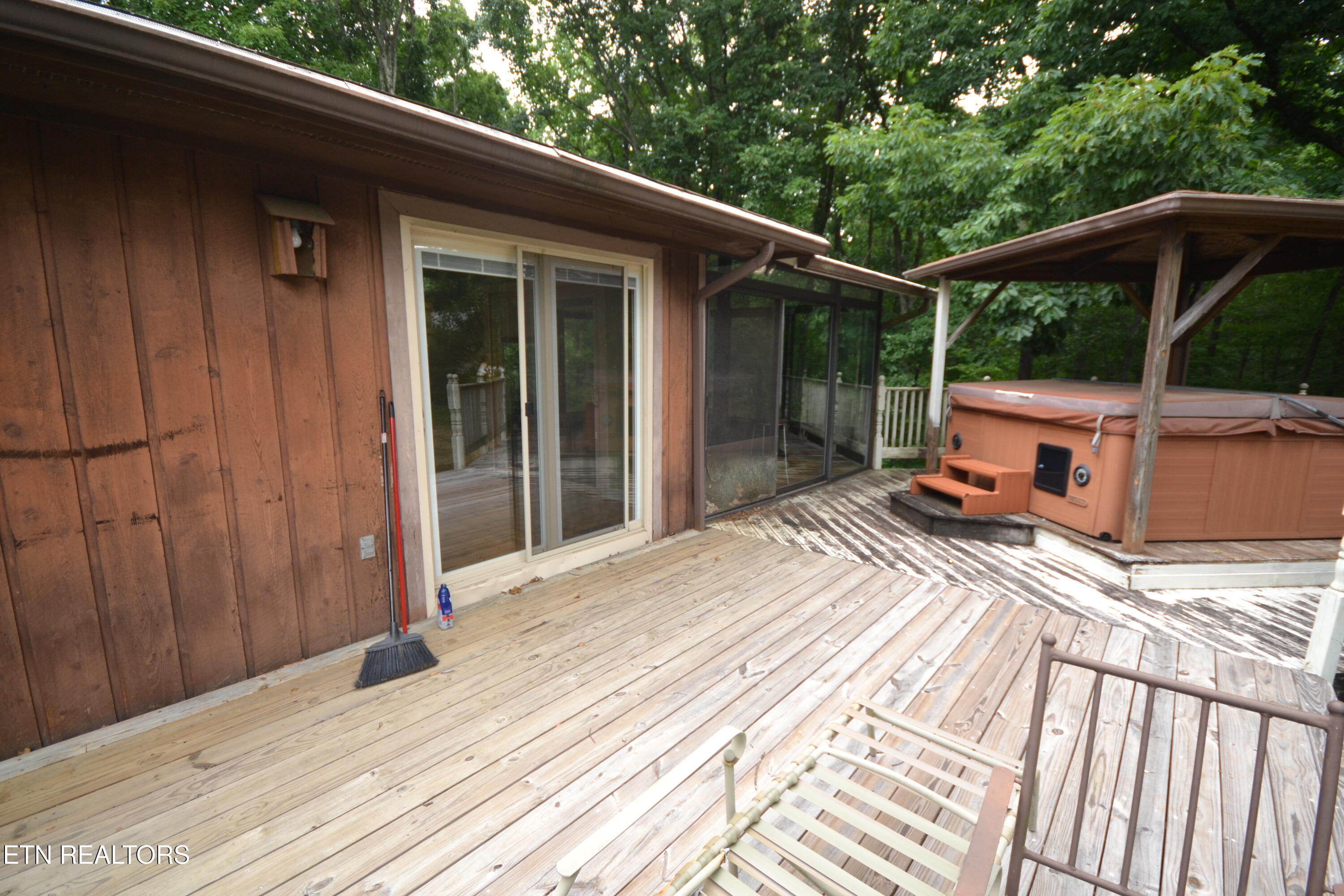 6703 Cate Road Powell, TN 37849 - Photo 11 of 23 Deck Hot Tub Sunroom